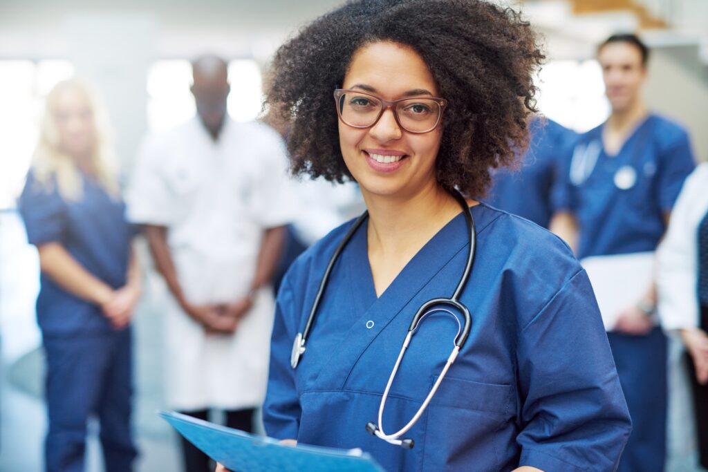 Pretty black doctor standing in the clinic Pretty black doctor standing in the clinic